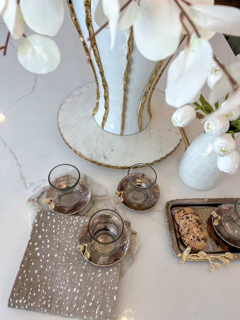 Glass Cup and Metal Saucer with Gold Flower Design