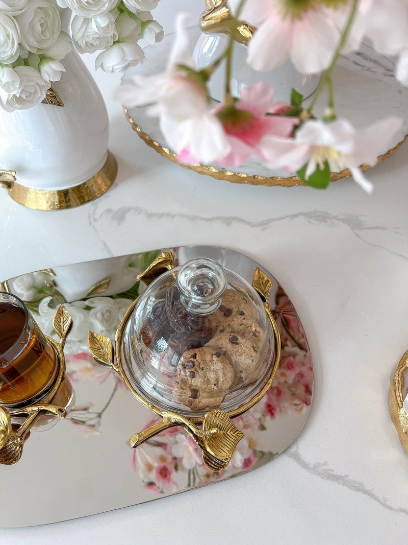 Silver Metal Oval Tray with Gold Leaf Details and a Glass Mug & Dome
